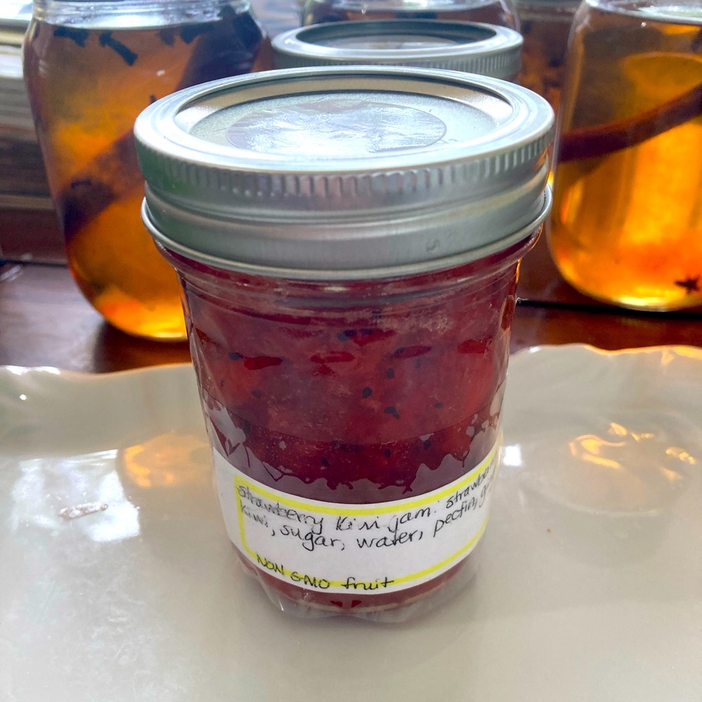 One half pint jar of strawberry kiwi ginger jam from Yellow Flower Farm. Yum